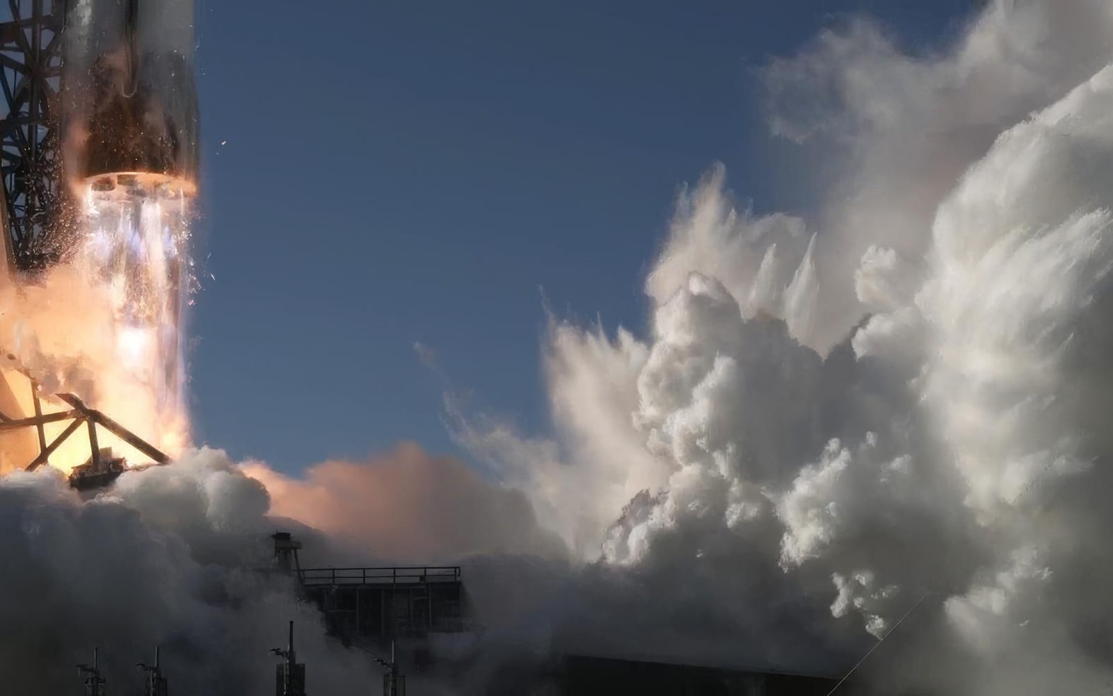 A rocket climbing through broken cloud on a long column of exhaust.