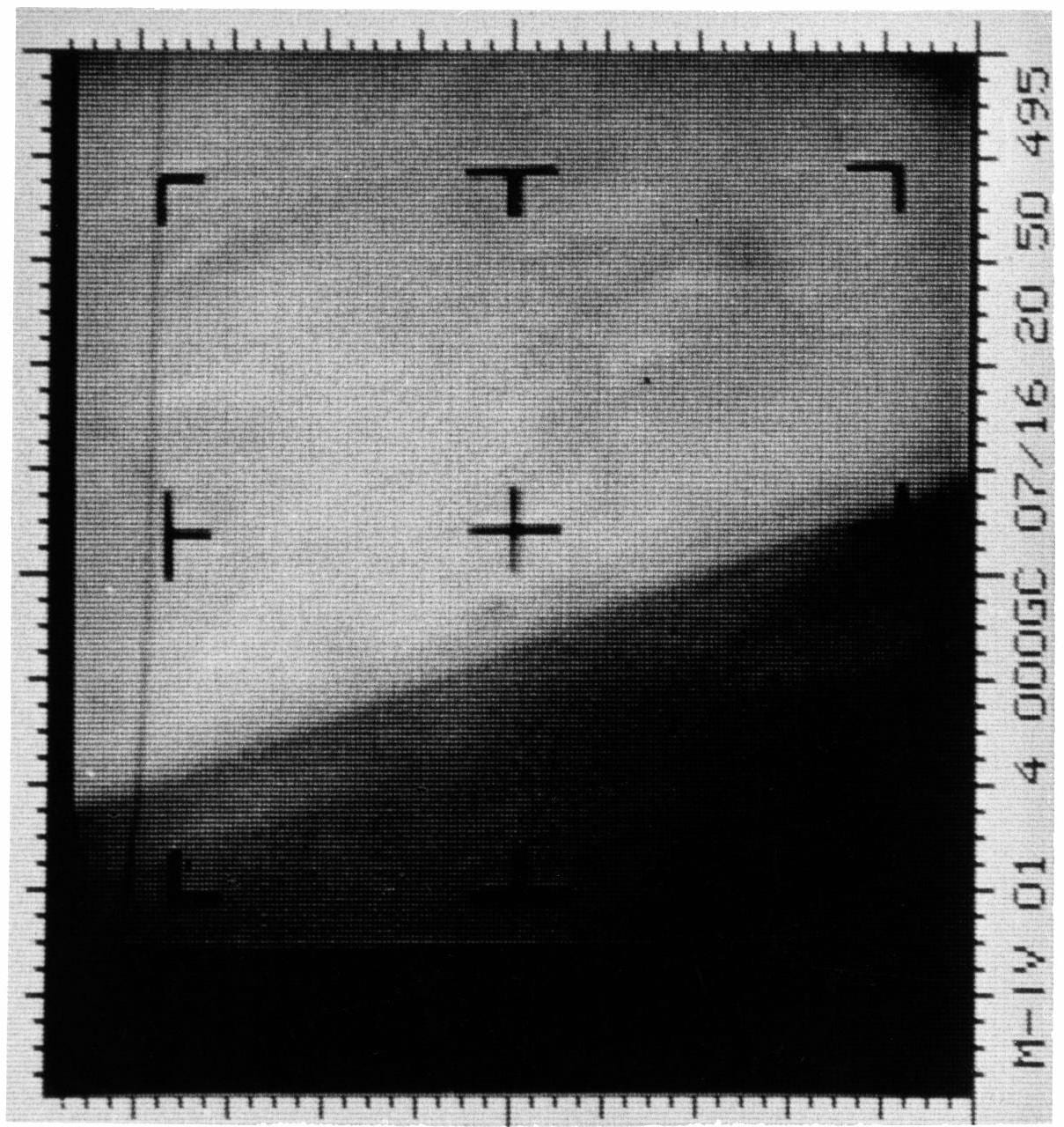 A coarse, high-contrast black and white frame showing the curved limb of Mars against black space.